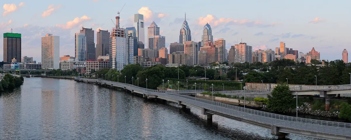 Pennsylvania: Four-segment panorama of Philadelphia skyline, as viewed from the South Street Bridge.